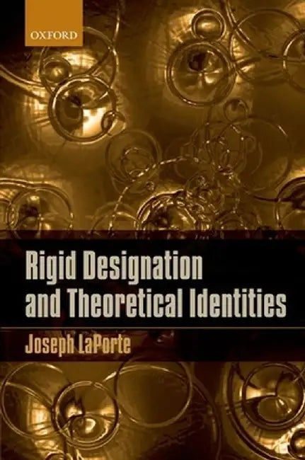 Rigid Designation And Theoretical Identities by Joseph LaPorte