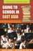 Going to School in East Asia by Gerard A. Postiglione