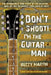 Don't Shoot! I'm the Guitar Man: The Remarkable True Story of the Musician Who Set Out to Change Lives, Note by Note by Buzzy Martin