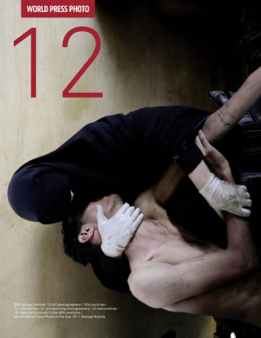 World Press Photo 12 by Kari Lundelin