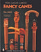 Tom Wolfe Carves Fancy Canes by Tom Wolfe