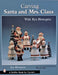 Carving Santa and Mrs. Claus by Ken Blomquist