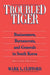 Troubled Tiger: Businessmen, Bureaucrats and Generals in South Korea by Mark L. Clifford