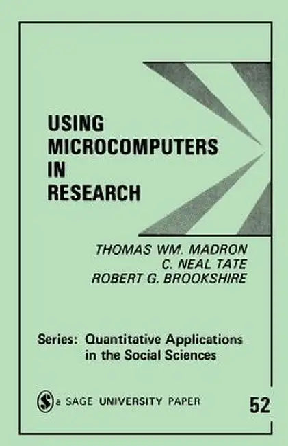 Using Microcomputers in Research by Thomas William Madron