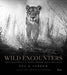 Wild Encounters: Iconic Photographs of the World's Vanishing Animals and Cultures by David Yarrow