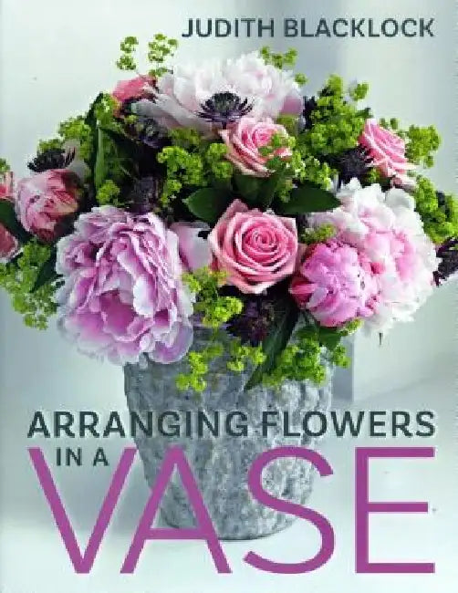 Arranging Flowers in a Vase by Judith Blacklock