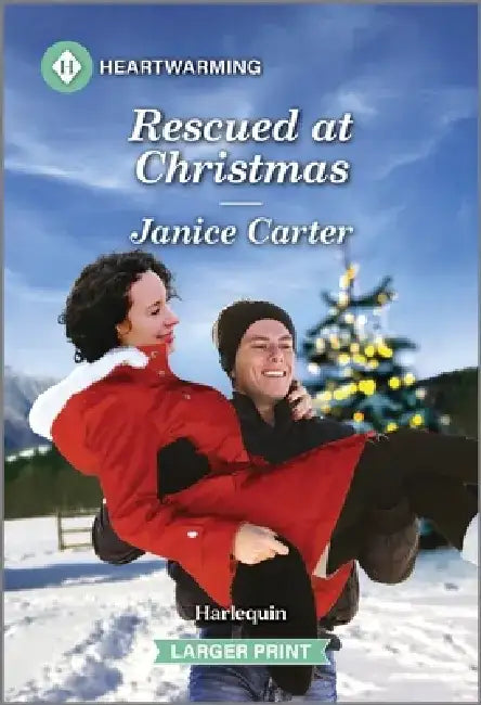 Rescued at Christmas: A Clean and Uplifting Romance by Janice Carter