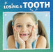 Losing a Tooth by Nicole A. Mansfield
