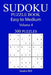 300 Easy to Medium Sudoku Puzzle Book by Sandra Bill