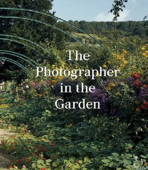 The Photographer in the Garden by Jamie M. Allen