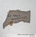 words on torn paper: Specificity by Ian Wood