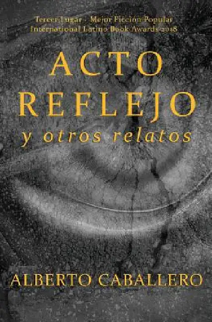 Acto reflejo y otros relatos by Caballero, Alberto