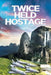 Twice Held Hostage by Donna J. Brown