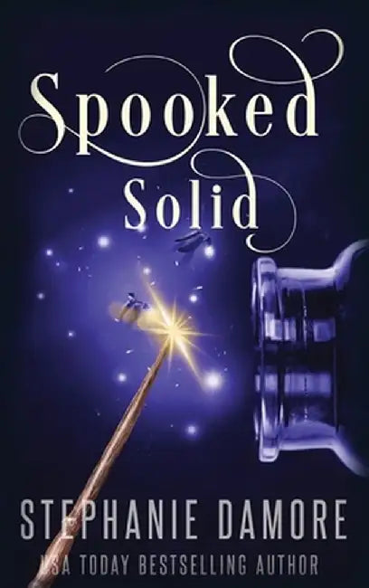 Spooked Solid: A Paranormal Cozy Mystery by Stephanie Damore