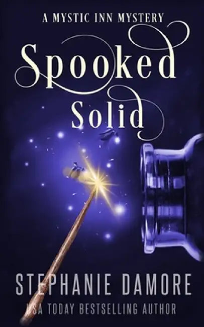 Spooked Solid: A Paranormal Cozy Mystery by Stephanie Damore