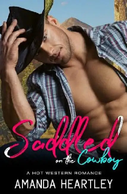 Saddled On The Cowboy: A Hot Western Romance by Amanda Heartley