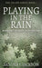 Playing In The Rain by Sandra J. Jackson