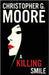 A Killing Smile by Moore, Christopher G.