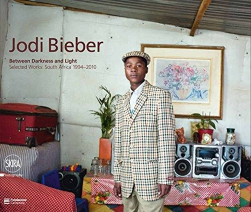 Jodi Bieber: Between Darkness and Light: Selected Works: South Africa 1994–2010 by Filippo Maggia