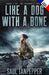 Comme un chien avec un os (édition française de Like a Dog With a Bone ): Un thriller de survie by Guillaume Ménard, Saul Tanpepper