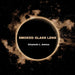 Smoked Glass Lens by Elizabeth L. Ambos
