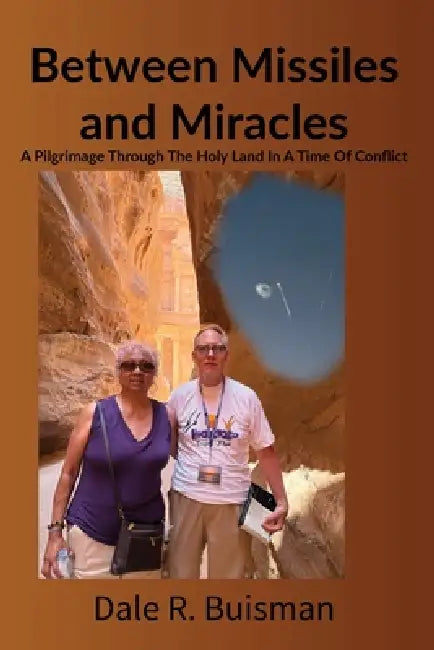 Between Missiles and Miracles: A Pilgrimage Through The Holy Land In A Time Of Conflict by Dale Ray Buisman
